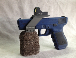 Pictured is a GLOCK BlueGun,with a Sight Mount in Tungsten, CeraKote finish and C-More STS Reflex Sigth System.